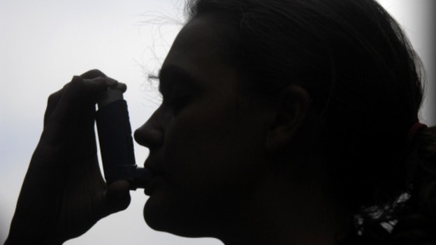 Woman with inhaler