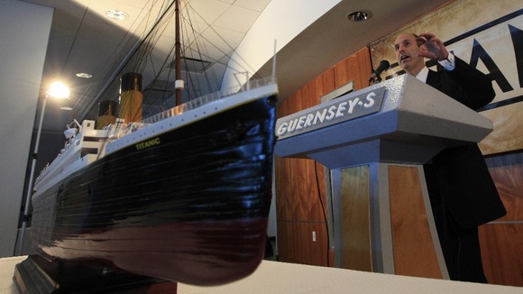 Brian Wainger, spokesman for Premier Exhibitions Inc. speaks during the Titanic Auction preview by Guernsey's Auction House in New York.