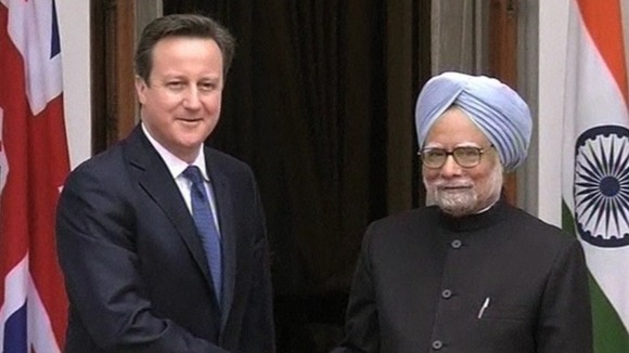 David Cameron shakes hands with India Prime Minister Manmohan Singh
