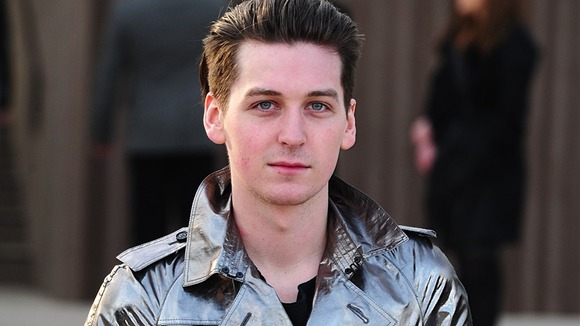 George Craig arrives at Fashion Week