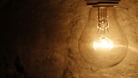 A general view of a lit light bulb.