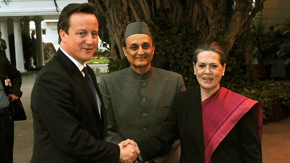 David Cameron shakes hands with Sonia Gandhi in New Delhi, India