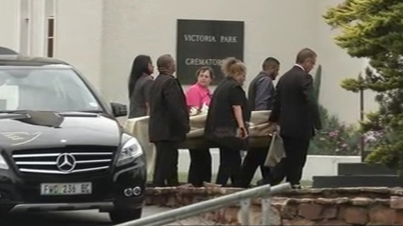 Reeva Steenkamp's casket arrives at funeral Pallbearers carry the casket into the crematorium in Port Elizabeth, South Africa