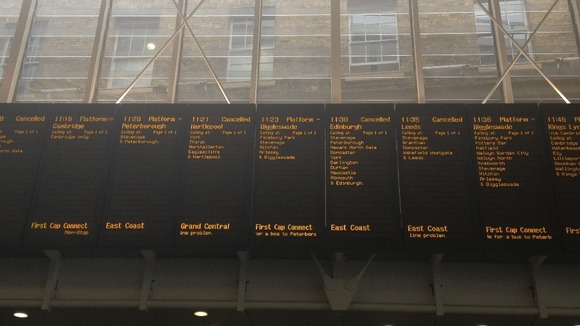 The departure board at King's Cross shows a large number of cancellations this morning