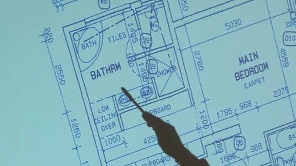 A projection of the floor plan of Oscar Pistorius' bathroom is shown to the court