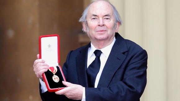 Sir Quentin Blake proudly holds his Knighthood