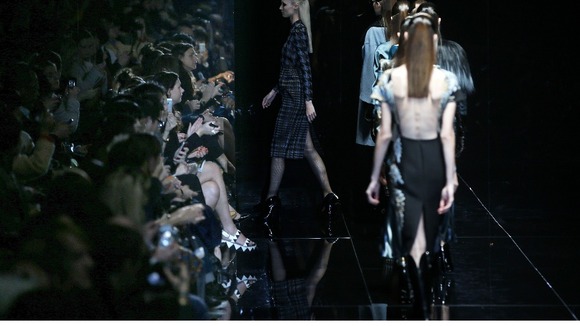 Models present creations from Gucci Autumn/Winter 2013 collection at Milan Fashion Week
