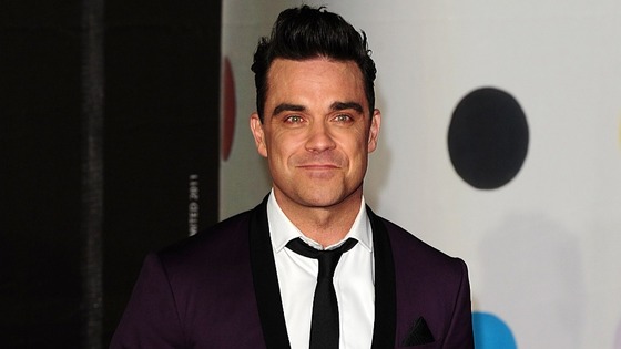Robbie Williams arriving for the 2013 Brit Awards 