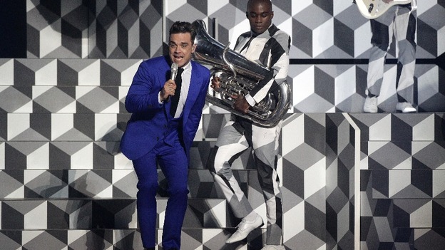 Robbie Williams performing at the Brit Awards