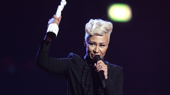 Emeli Sande holds her Brit Award for best British female