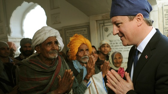 Prime Minister David Cameron in the Golden Temple at Amritsar, Punjab, yesterday. 