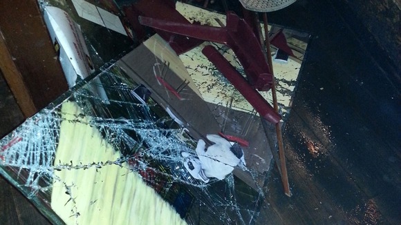 Smashed glass at the Smoking Dog pub in Lyon