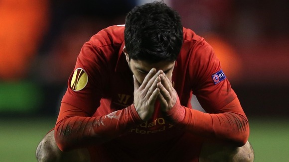Liverpool's Luis Suarez shows his dejection after the final whistle