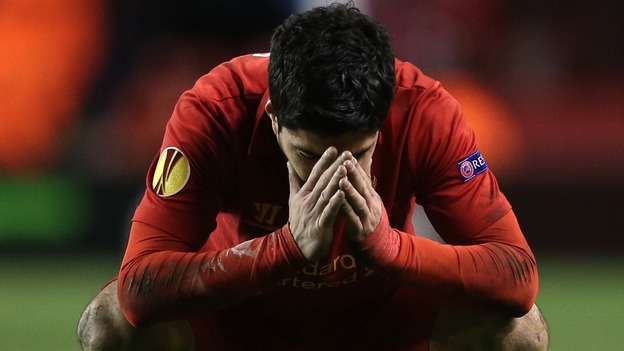 Liverpool's Luis Suarez shows his dejection after the final whistle