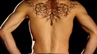 Tattoo across a man's back