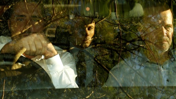Oscar Pistorius was pictured through a car window leaving court