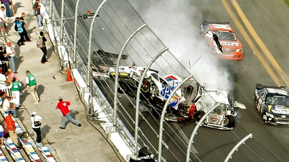 DATE IMPORTED:February 24, 2013NASCAR driver Kyle Larson (32) and his Chevrolet end up in the fence during the final lap crash