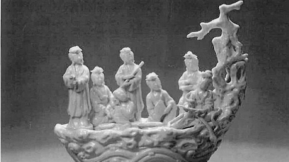A Dehua porcelain figurine stolen during the raid.