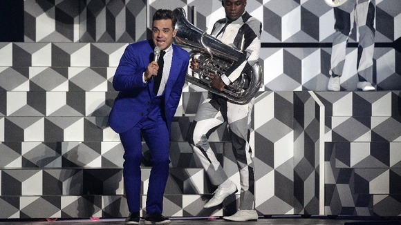 Robbie Williams pictured performing at Brit Awards last week.