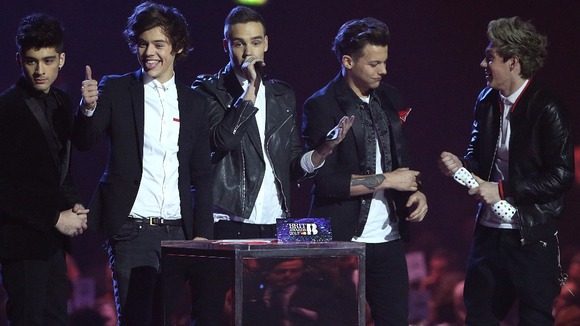 One Direction picking up the Global Success Awards at the Brits .