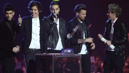 One Direction picking up the Global Success Awards at the Brits .