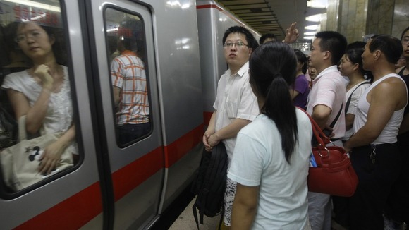 Zhang purchased the belly in order to get seats on the crowded Beijing subway