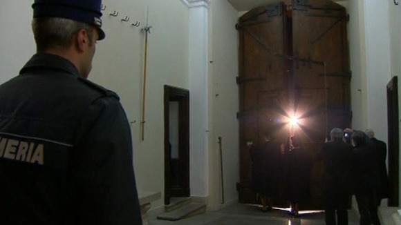 The Swiss Guards close the doors of the residence at Castel Gondolfo.