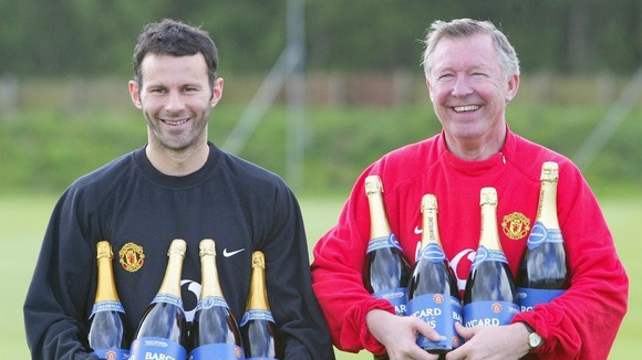 May 2003. Manchester United manager Sir Alex Ferguson (right) with player Ryan Giggs.