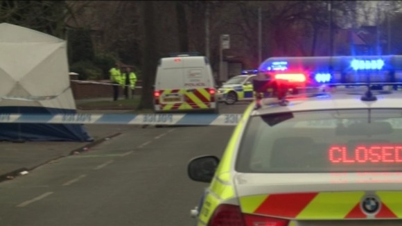 Several police cars on the scene after body found in Chorlton.