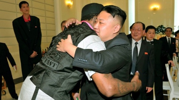 Dennis Rodman and North Korean leader Kim Jong-un pictured hugging.