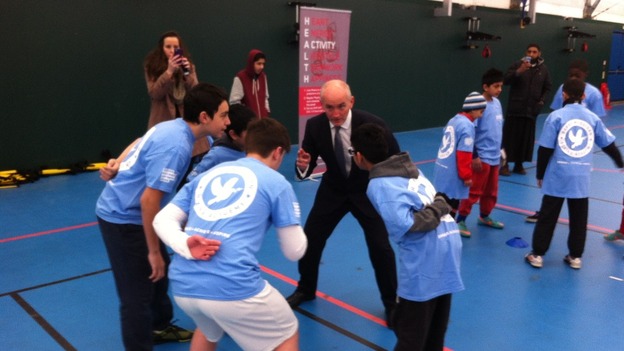 Barry McGuigan with some children attending the opening of the Take 12 Challenge