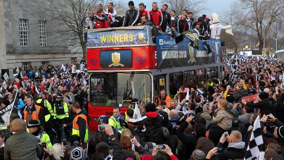 Swansea City parade the Capital One Cup through the streets of Swansea.