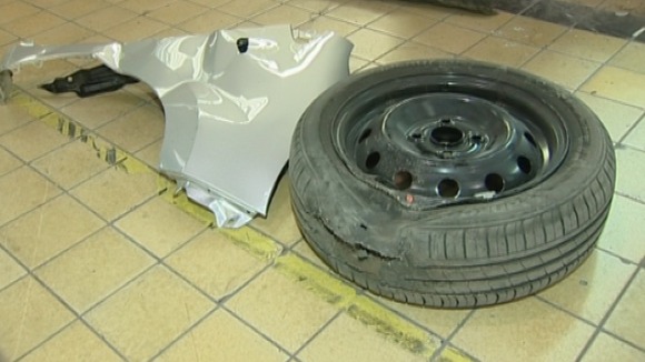 A wheel and panel was ripped off