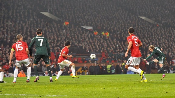 Real Madrid's Luka Modric (right) scores his teams first goal of the game