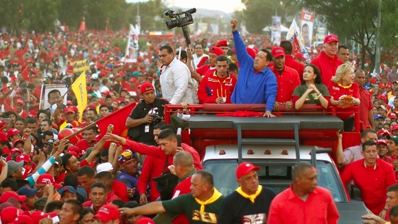 Venezuela's President Hugo Chavez speaks in the rain during his closing campaign rally in Caracas last year