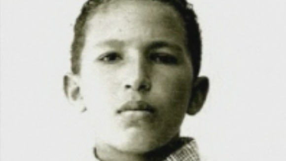 A young Hugo Chavez stares down the lens