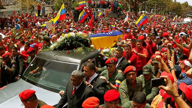 The coffin of President Hugo Chavez is driven through the streets of Caracas