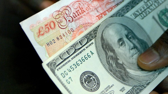 Pound rallies against the dollar after QE decision