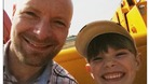 Finn Robinson, 8, with dad Adam.