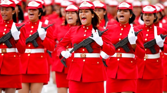Venezuelan soldiers march during a military parade to commemorate the failed coup against Chavez, in Feb 2012