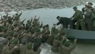 Soldiers cheer Kim Jong-un as he leaves the military base