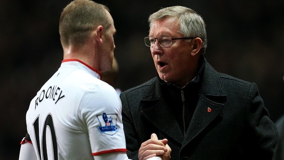 Manchester United manager Sir Alex Ferguson and Wayne Rooney last year