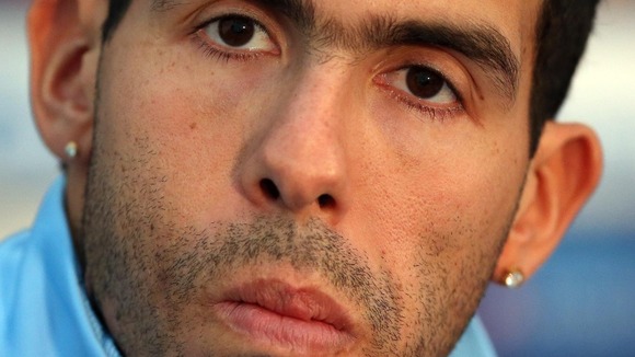 Manchester City striker Carlos Tevez arrested by police on suspicion of drink-driving.