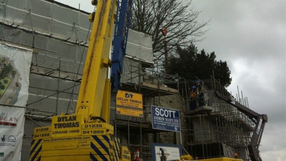 Crane removing first of stanchions support Cardigan Castle