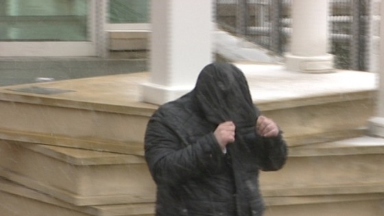 Russell Yates hid his face when he left court after being found guilty last month
