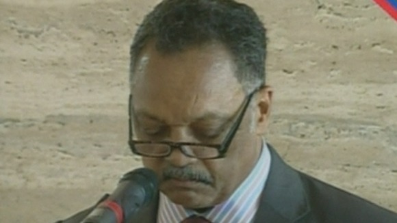 Reverend Jesse Jackson giving a sermon at the funeral