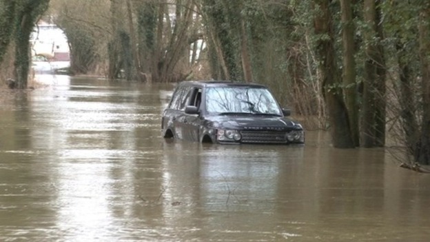 A car that got trapped in floods in Norfolk