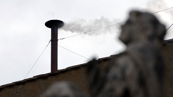 White smoke from the chimney on top of the Vatican's Sistine Chapel when Benedict XVI was elected new pope in 2005