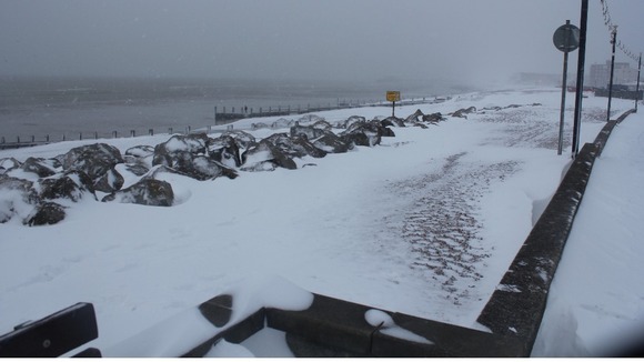 Snow on the Worthing shoreline