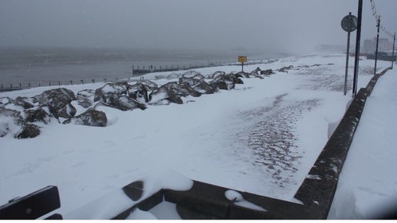 Snow on the Worthing shoreline